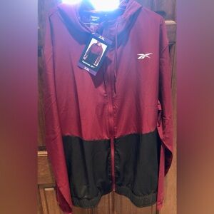 Reebok men’s zip up rain jacket. Hooded maroon jacket in size xxl